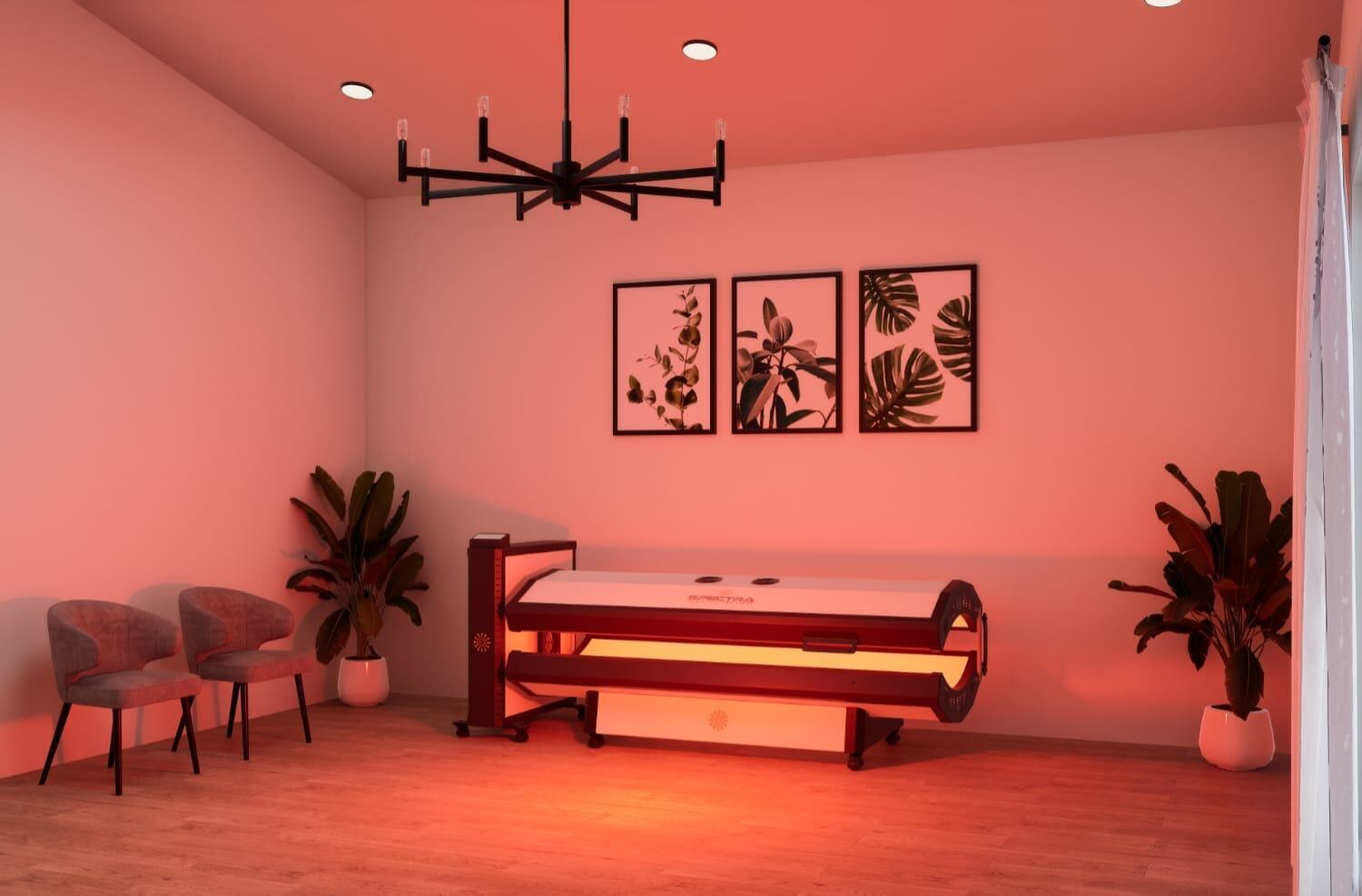The Spectra S10 Pro red light bed switched on in a calm treatment room with two chairs, plants and framed botanical prints
